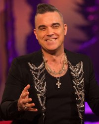 Robbie Williams retrouve Take That pour un concert virtuel