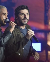 Patrick Fiori a reçu "un coup de pied aux fesses" de la part de Slimane