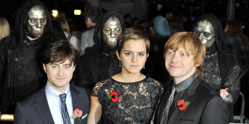 Daniel Radcliffe, Emma Watson et Rupert Grint lors de la première mondiale de