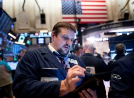 Wall Street quasi-stable après la décision de la Fed et une salve de résultats