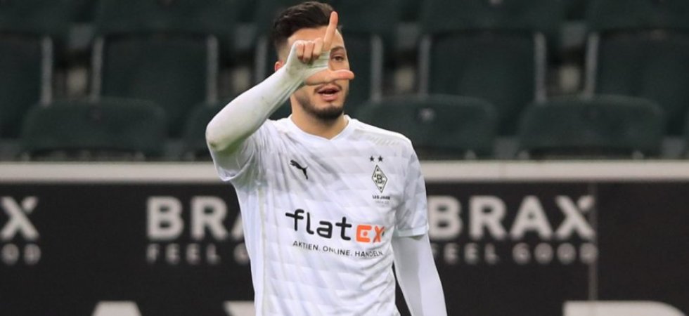 Man Utd : Bensebaini dans le viseur