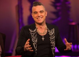 Robbie Williams chante Noël... et la Covid !