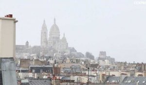 Premières chutes de neige de l'année sur les toits de Paris