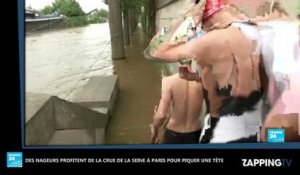 Crue à Paris : Des nageurs font des longueurs dans la Seine (Vidéo)