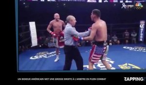 Un boxeur américain met une grosse droite à un arbitre en plein match