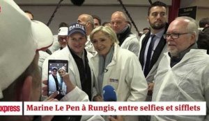 Marine Le Pen à Rungis, entre selfies et sifflets