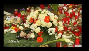 Fleurs et bougies en hommage aux victimes du crash