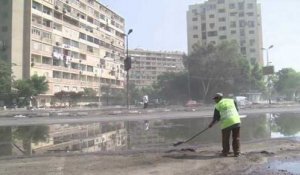 Nettoyage des rues du Caire après la répression sanglante