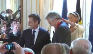Didier Reynders reçoit les insignes de la Légion d'honneur des mains de Nicolas Sarkozy