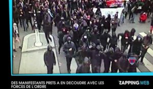 COP21 : Des manifestants lancent sur les forces de l'ordre des bougies déposées pour les victimes des attentats de Paris