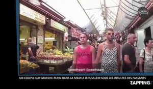 Un couple gay marche main dans la main à Jérusalem sous les insultes des passants