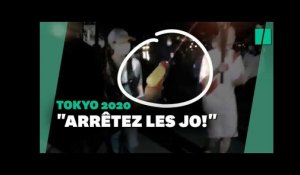 JO de Tokyo 2021: Une femme tente d'éteindre la flamme olympique avec un pistolet à eau