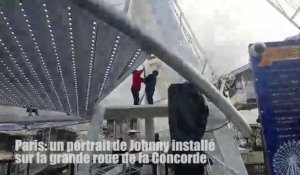 Un portrait de Johnny installé sur la grande roue de la Concorde à Paris