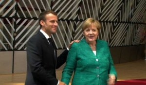 Macron et Merkel arrivent à Bruxelles pour un sommet clé