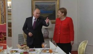 G20: petit-déjeuner de travail entre Merkel et Poutine