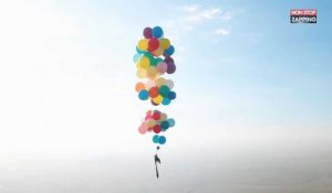 Il vole dans le ciel porté par des ballons gonflés à l'hélium, assis sur une chaise de camping ! (vidéo)