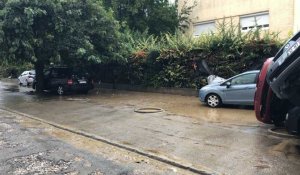  Trèbes. Sur un parking du quartier de l'Aiguille après les inondations dans l'Aude