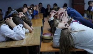 Ukraine: des écoliers vivent au rythme de la guerre