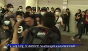 Hong Kong: les manifestants se heurtent aux habitants
