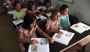Irak: dans un camp, les enfants syriens travaillent ou étudient