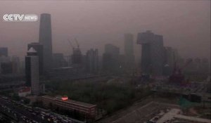Une tempête de sable assombrit le ciel de Pékin