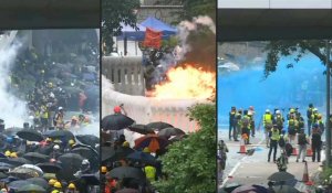 Usage de gaz lacrymogènes et de canons à eau Hong Kong au cours d'affrontements entre police et manifestants