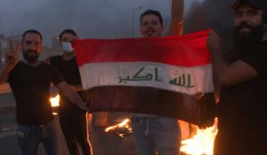 Irak: des manifestants brûlent des pneus lors d'affrontements à Bagdad