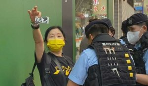 Hong Kong: la police arrête une militante pro-démocratie lors du 34e anniversaire de Tiananmen