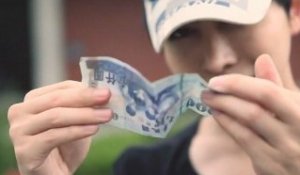 Magicien chinois change la monnaie de billets de banque
