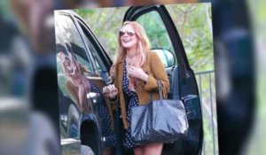 Lindsay Lohan a l'air heureuse en quittant sa cure