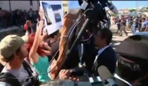 Barroso et Letta accueillis aux cris de "honte!", "assassins!" à Lampedusa