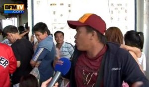 Reportage: les rescapés du typhon se pressent à l'aéroport de Tacloban - 12/11