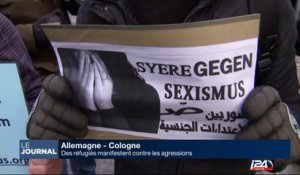 Des réfugiés manifestent contre les agressions à Cologne