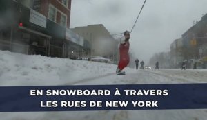 En snowboard à travers les rues de New York