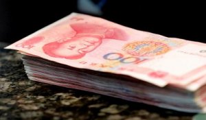 Le yuan au plus bas depuis huit ans face au dollar