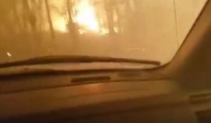 Évacuation d'un incendie de forêt en pick-up