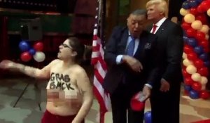 Une Femen s'incruste pendant l'inauguration d'une statue de Donald Trump à Madrid !