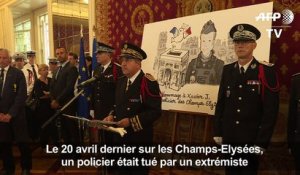 Médailles aux policiers après l'attentat aux Champs-Elysées
