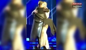 Céline Dion : Une fan déchaînée lui grimpe dessus en plein concert (Vidéo)