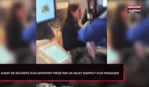Un agent de sécurité d’un aéroport piégé par un objet suspect d'un passager (Vidéo)
