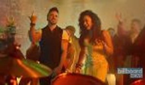 Luis Fonsi & Demi Lovato's 'Echame La Culpa' Music Video Reaches One Billion Views on YouTube | Billboard News
