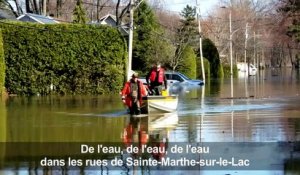Rues inondées près de Montréal, des milliers d'évacuations