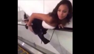 Elle tente une glissade sur la rampe de l'escalier  et va le regretter