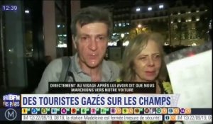 Un policier a tiré du gaz lacrymogène sur ce couple sur Champs-Élysées pendant la manifestation de samedi