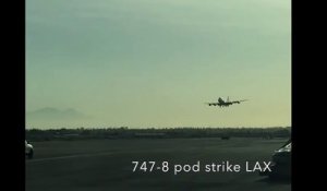L'aile de cet avion 747 touche la piste à l'atterrissage !