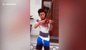 Talented student stranded at airport plays violin at hotel