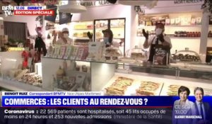 Contents de reprendre, les salariés d'une épicerie à Nice applaudissent lors de leur réouverture