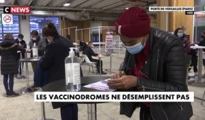 Coronavirus - Face à la propagation du variant Omicron, les vaccinodromes ne désemplissent pas avec de nombreuses personnes qui se déplacent pour recevoir leur dose de vaccin - VIDEO