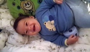 Baby laughing funny