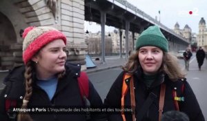 Attaque Paris - Un quartier et des touristes sous le choc après l'attaque meurtrière de samedi